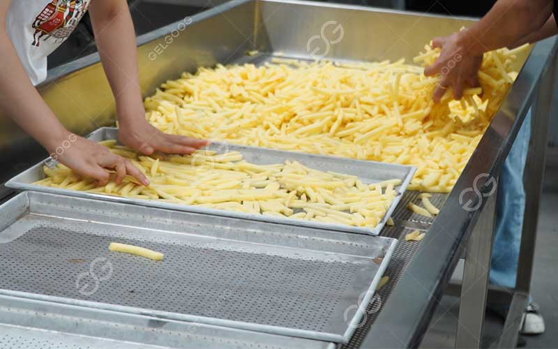 how are frozen french fries made step by step